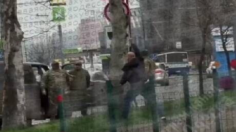 Ukrainian citizen confronts military recruiters in Odesa