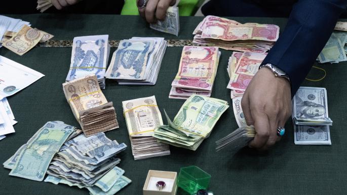 انخفاض الدينار العراقي بعد طباعة 25 تريليون دينار